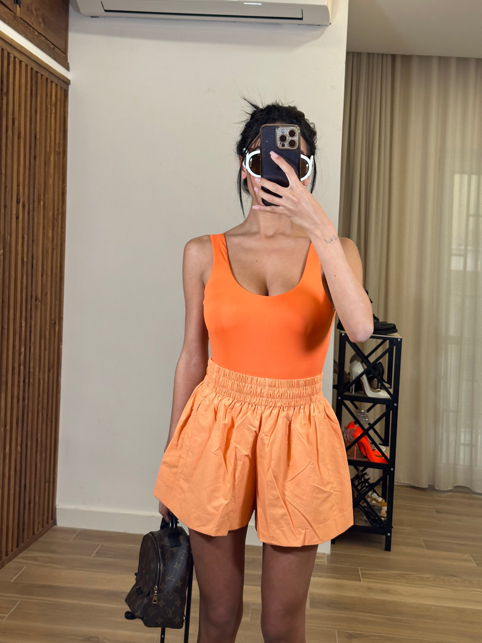 Shorts arancio